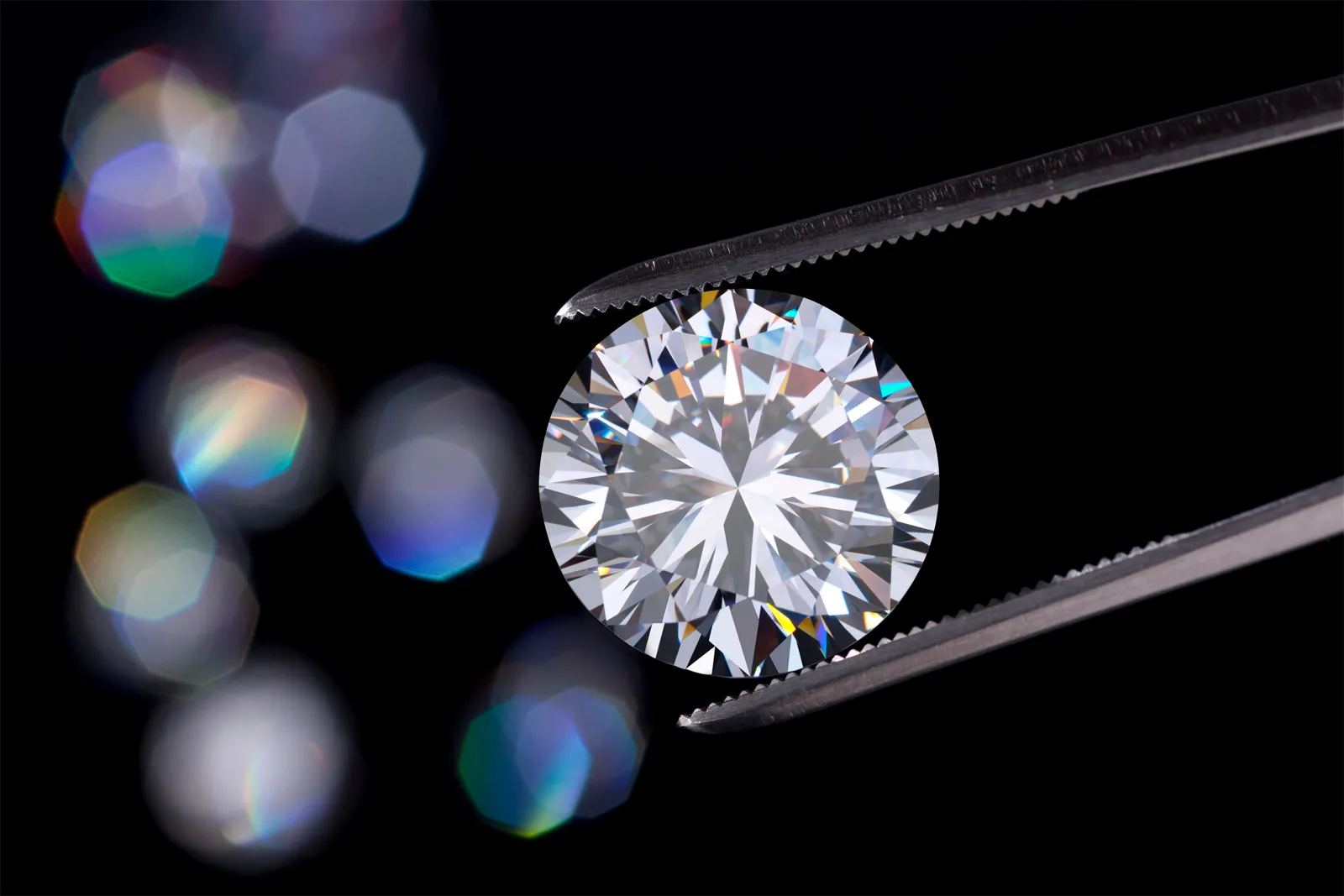 jewelrs-tweezers-holding-a-diamond